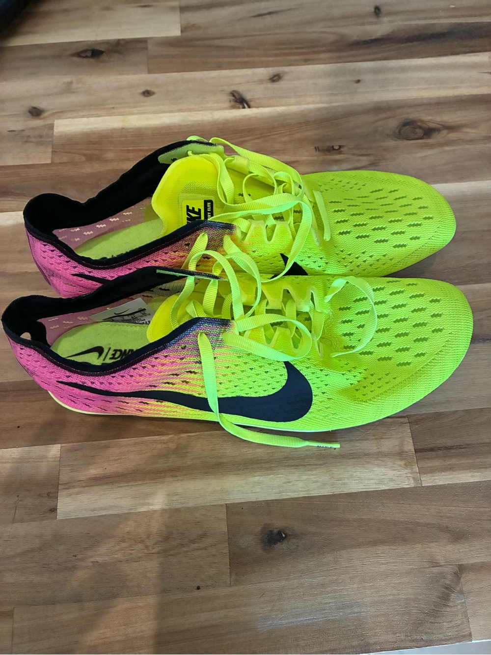 Nike womens Bright Pink & Neon Yellow Athletic racing distance spiked track shoe